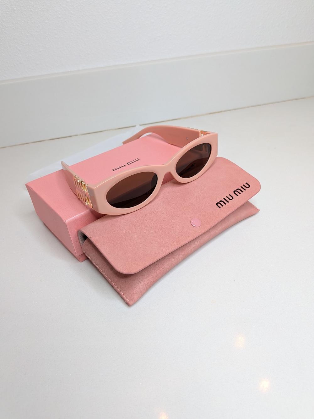 Miu Miu Pink Cat-Eye Sunglasses with Gold Logo Accent - Picture 3 of 12